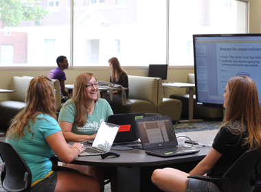 students working in the digital media hub